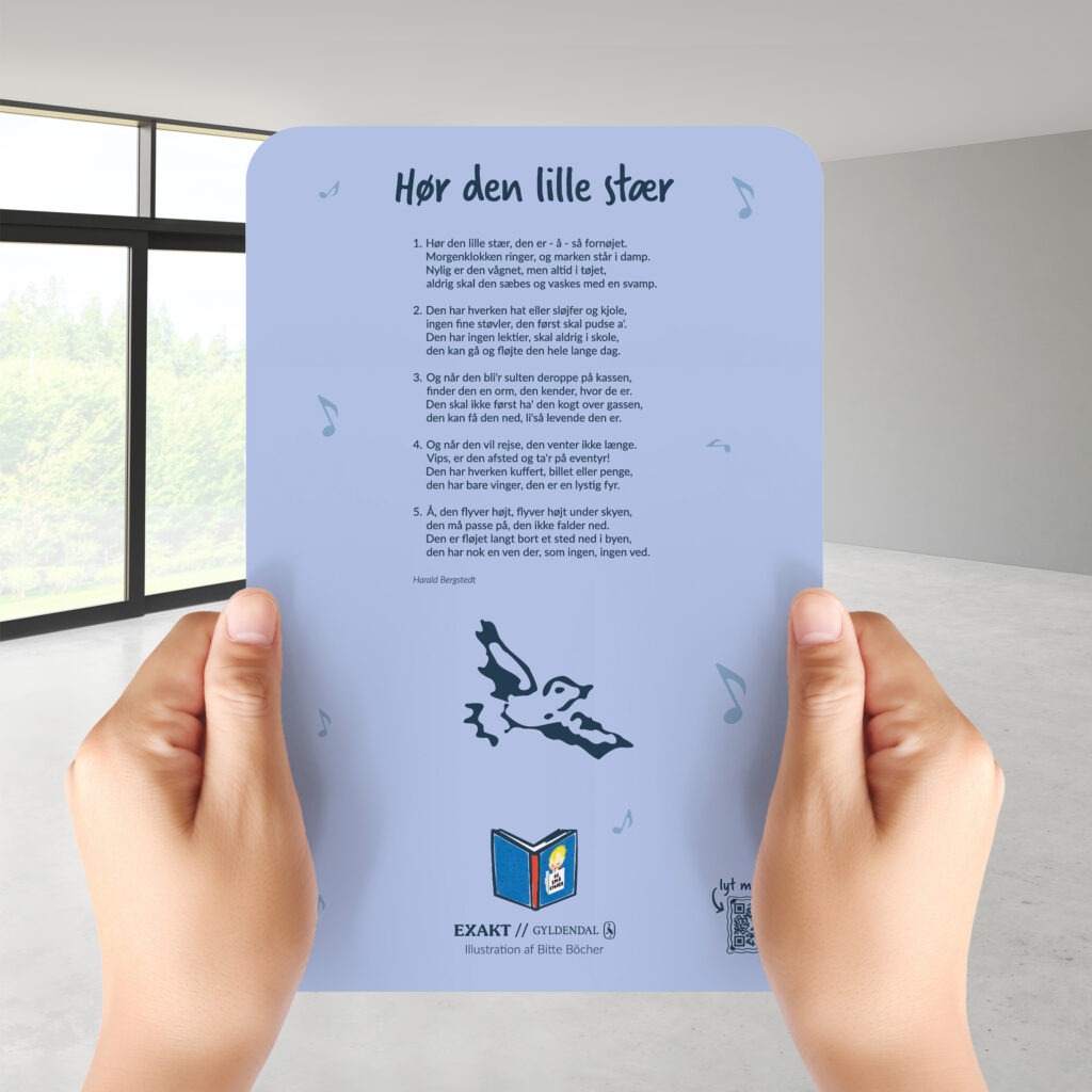 holding white a blank A4 paper