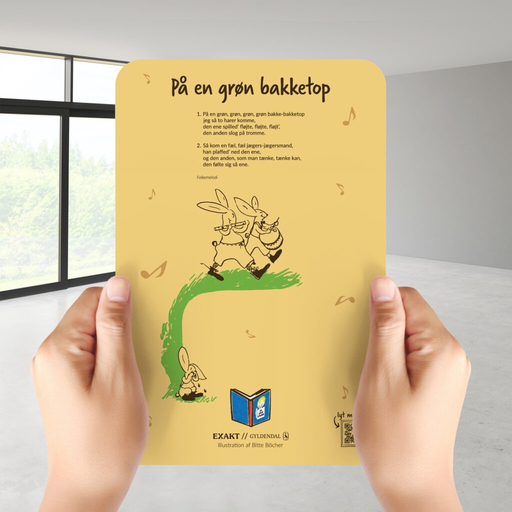 holding white a blank A4 paper